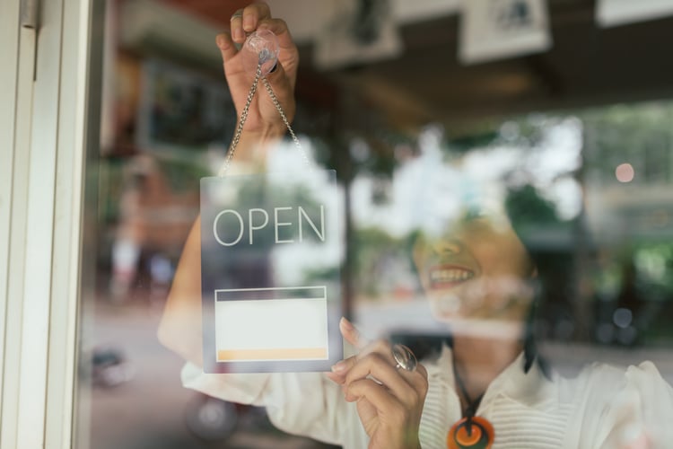 Image of restaurant owner opening up for the first time