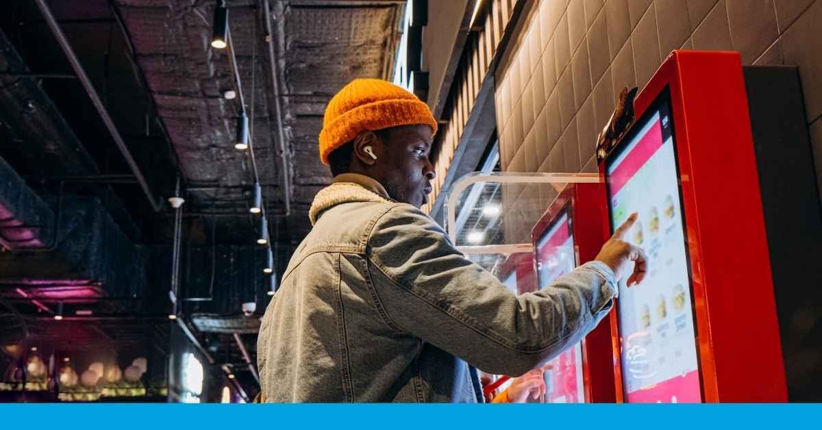 Customer using digital kiosk in-store